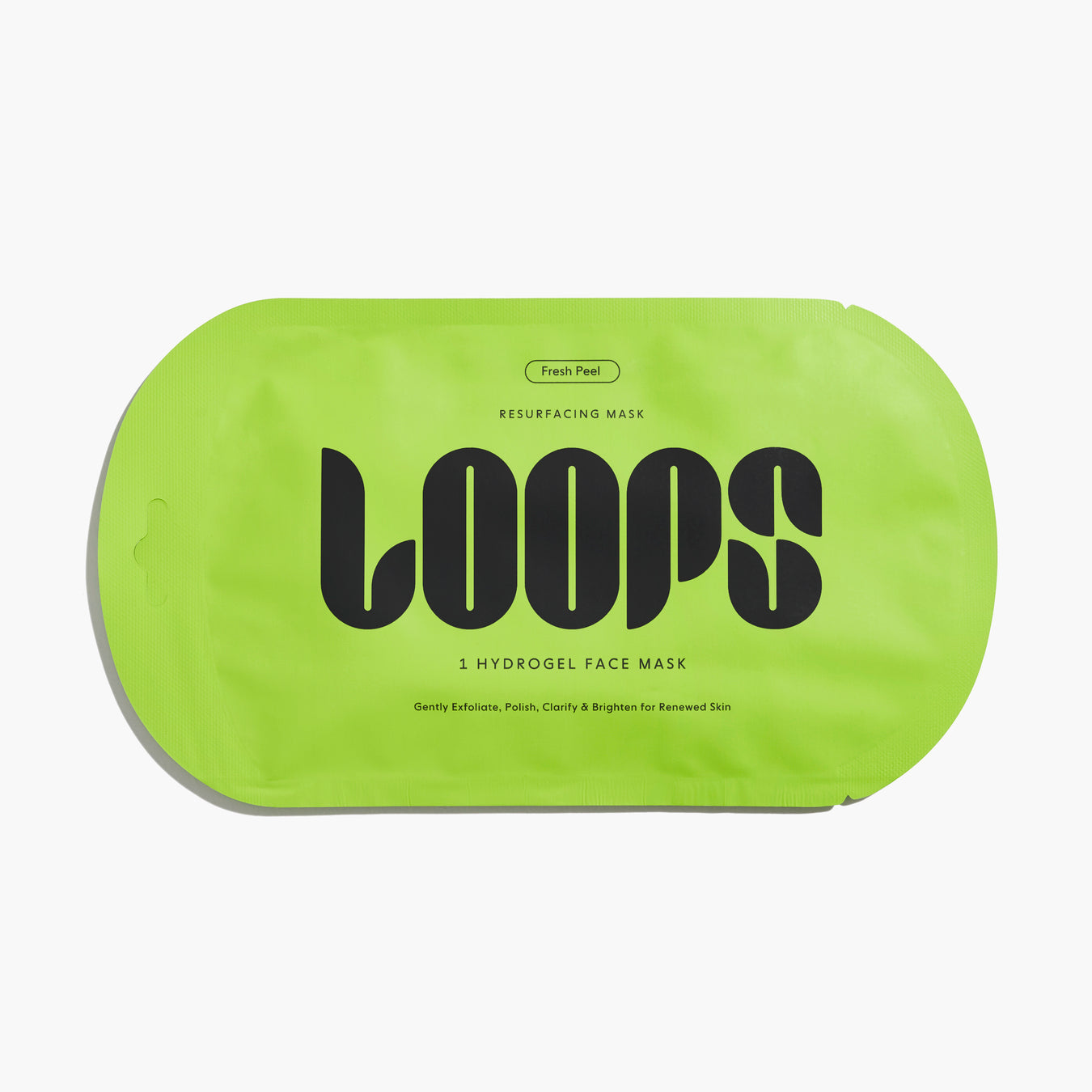 Oval shaped LOOPS Fresh Peel face mask in green packaging.