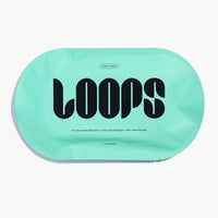 Oval shaped LOOPS Clean Slate face mask in light blue packaging.