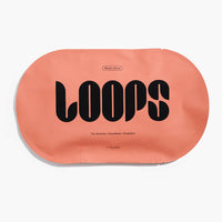 Oval shaped LOOPS Weekly Reset face mask in orange packaging.