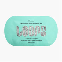 A mint green Clean Slate single-use face mask packet with 'LOOPS' written in glittery silver letters