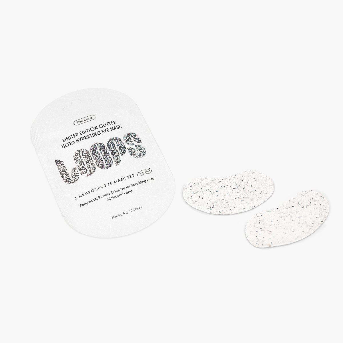 Close up details of glitter eye mask and product packaging