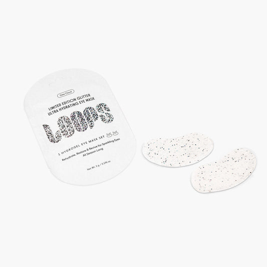 Close up details of glitter eye mask and product packaging