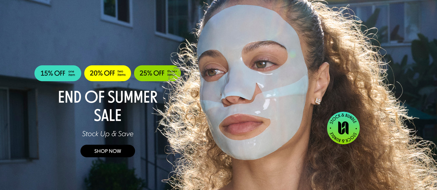 A promotional summer sale banner featuring a woman outdoors with a white sheet mask on her face. Large text reads 'END OF SUMMER SALE', 'Stock Up & Save', and 'SHOP NOW', with discount badges at the top and a circular 'Stock & Bundle' badge at the lower left.