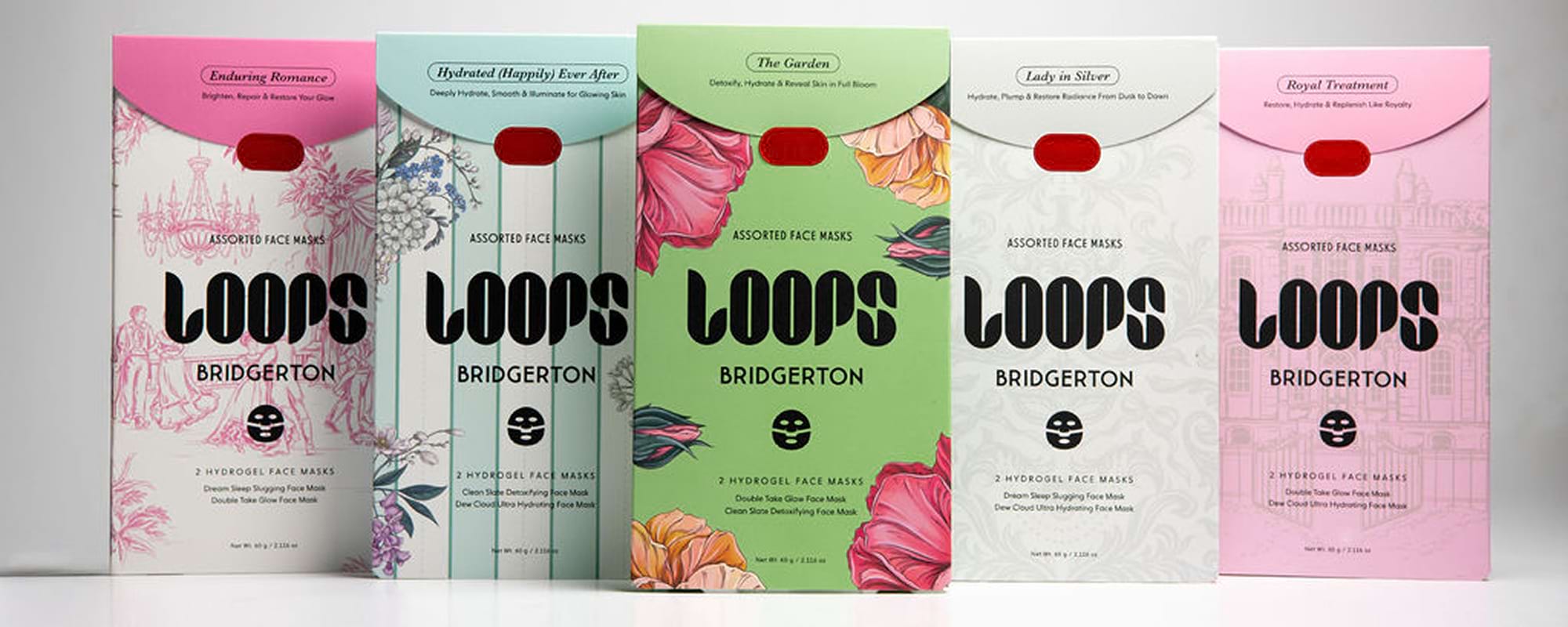 Five packages of Loops Bridgerton face masks on a white background