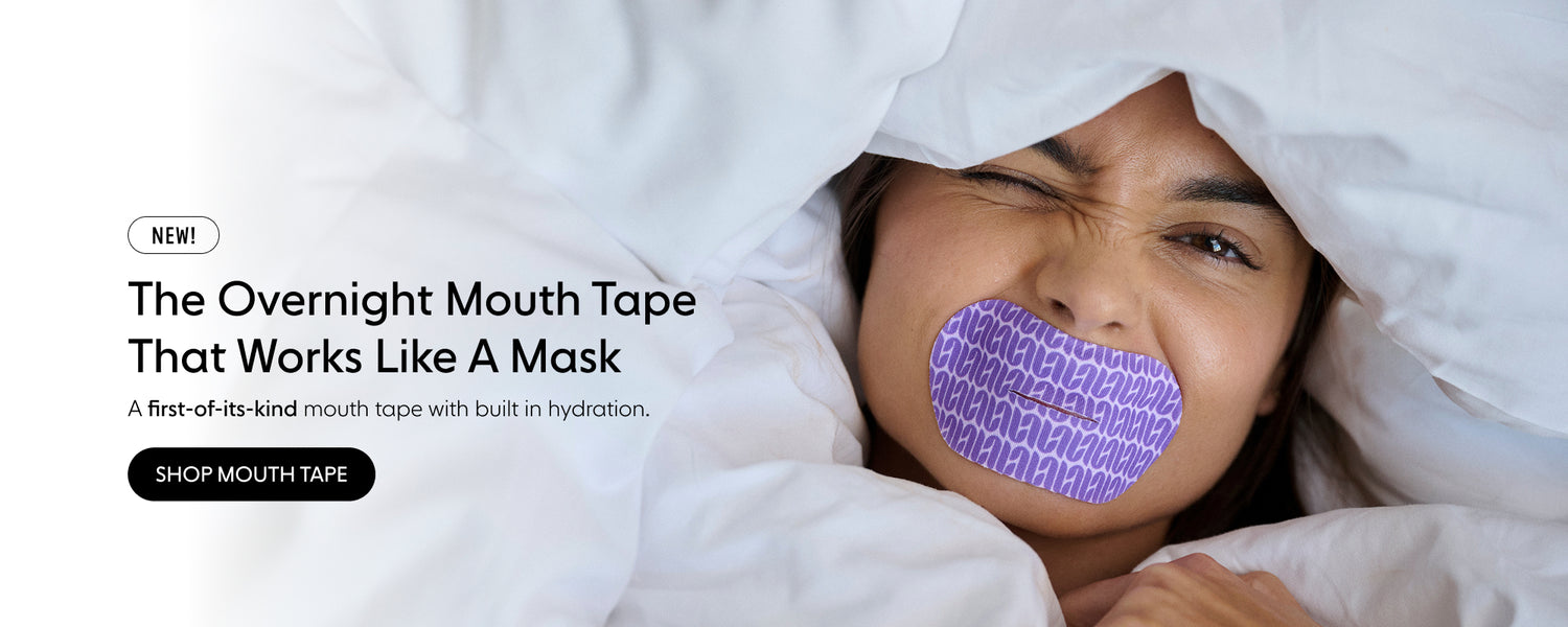 Person with a purple mouth cover in bed, advertising overnight mouth tape.