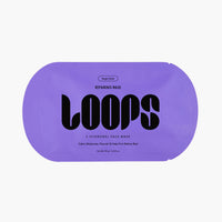 A purple oval-shaped sheet mask package with bold black text reading 'LOOPS' and smaller text 'Night Shift Repairing Mask' on a light gray background.